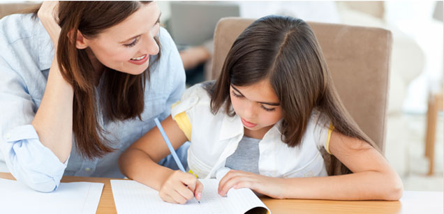 Image of parent helping child study.